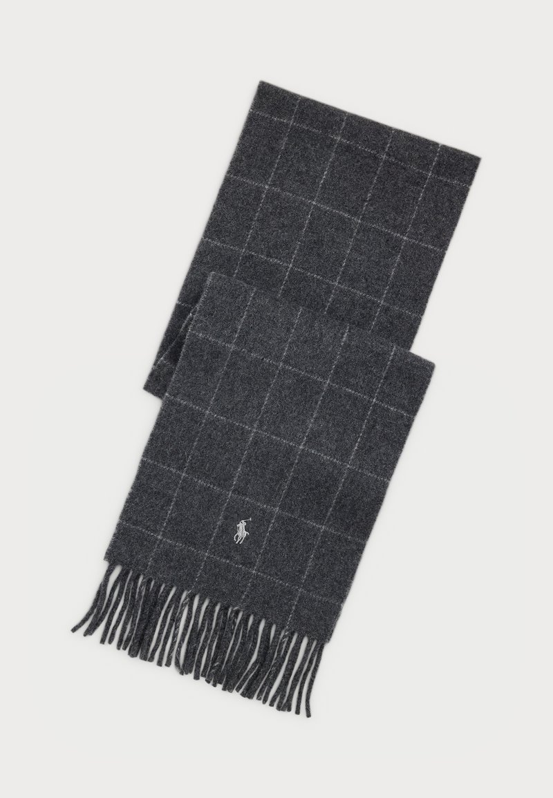 Pelēka vilnas šalle ar pārbaudes rakstu, frizētiem maliem un nelielu izšūtu logotipu vienā galā. Mīksta tekstūra un taisnstūra forma.