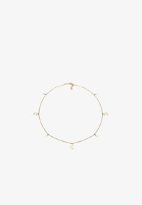 Seleccionado, gold-coloured