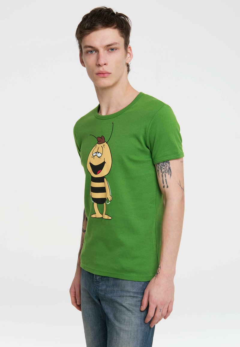 Green cotton t-shirt featuring a cartoon bee graphic with a smiling face and black stripes. Short sleeves and a crew neckline.