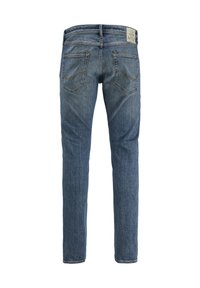 Jeans clasice din denim albastru, cu croi drept, cinci buzunare și cusături contrastante. Dispune de o etichetă de marcă pe banda de talie.