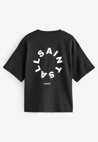 Juoda trumpa rankovė t-shirt su apvalia baltu grafiniu piešiniu, kuriame yra žodis "SAINT" ir "LONDON" apačioje. Pagaminta iš minkštos medvilnės medžiagos.