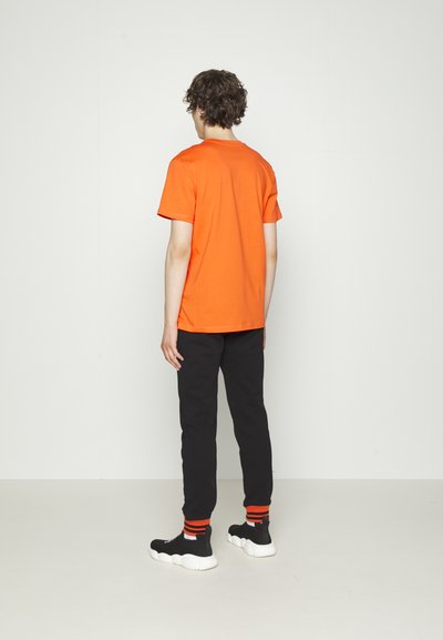 MOSCHINO T-shirt estampada - fantasy red