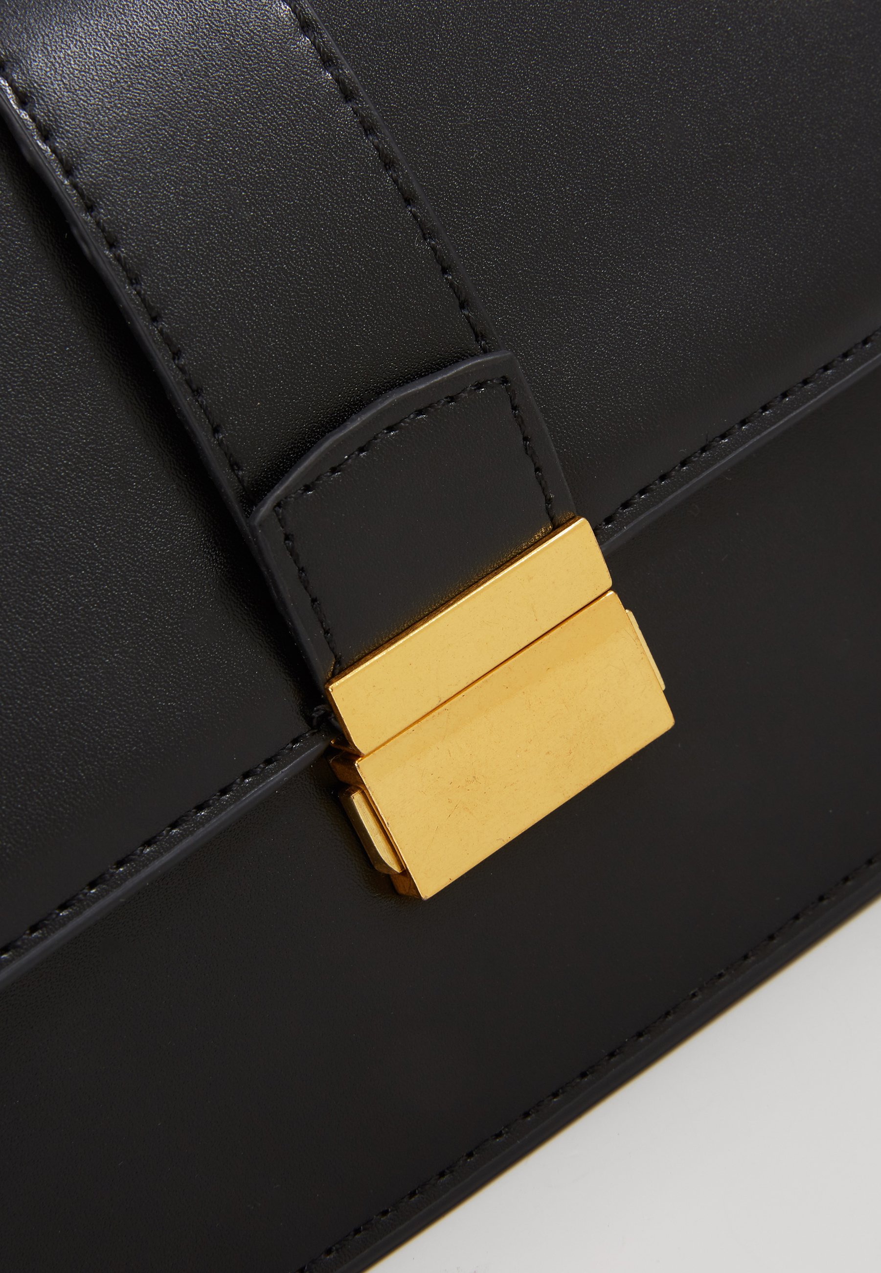 Gina Tricot JOLINE BAG Skulderveske blackantique gold Gina Tricot KYLIE BAG Skulderveske black Zalando.no