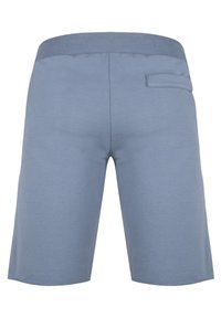 Vaaleansiniset lyhyet housut, jotka on valmistettu pehmeästä kankaasta. Niissä on joustava vyötärö ja yksi takatasku. Sileä pinta ja yksinkertainen muotoilu.