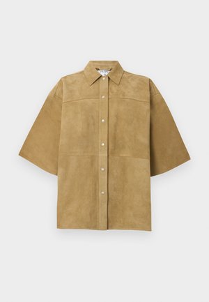 Short-sleeve tan suede shirt with pointed collar and six front snap buttons, displayed flat against a white background.