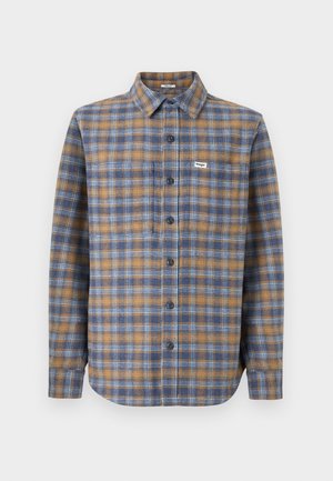 Button-up shirt in een geruit patroon met blauwe, bruine en crèmekleurige tinten. Lange mouwen, standaard kraag en zes knopen aan de voorkant.