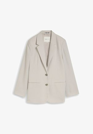 Light beige women's blazer with two buttons, notch lapel collar, and front welt pockets, laid flat on a white background.
