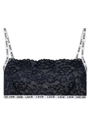 Bralette de renda azul-marinho com bordas recortadas e alças brancas ajustáveis, apresentando um padrão de logotipo repetido. Textura suave e design ajustado.