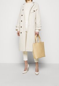 CLOSED Långärmad tröja - light yellow