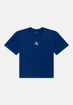 Navy blue cotton t-shirt with short sleeves, crew neck, and a small white "cK" logo on the front. Smooth texture, standard fit.