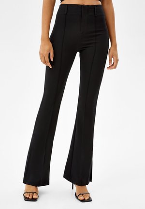 FLARE WITH SPLIT HEMS - Kalhoty - black