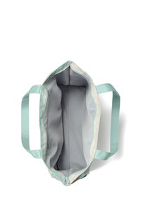 Ljust grå och beige tote-väska med mintgröna handtag, som visar ett rymligt, tomt inre och en dragkedjeficka inuti.