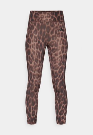 Κ ολάν με σχέδιο λεοπάρ σε αποχρώσεις καφέ και μαύρου, με ψηλή μέση, κατασκευασμένο από λείο, ελαστικό ύφασμα, σχεδίαση μέχρι τον αστράγαλο.