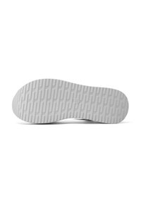 Suola di sneaker bianca con motivo testurizzato. Presenta un materiale in gomma liscio e una forma ampia e arrotondata per garantire stabilità.