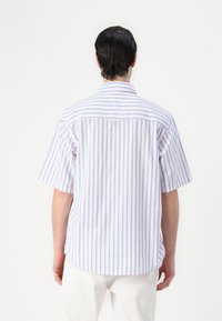 Tommy Jeans SHIRT - Shirt - ecru