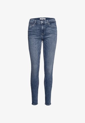 Jeans de corte slim hechos de denim azul oscuro con un diseño clásico de cinco bolsillos, cierre de cremallera y un sutil desgaste en la parte frontal.