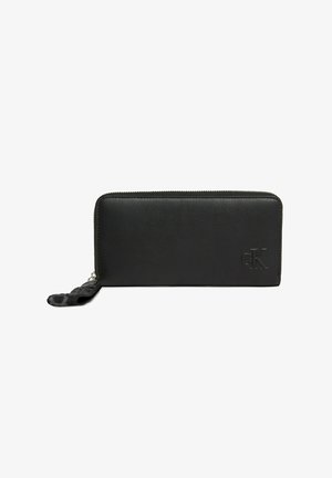 Calvin Klein Jeans RFID WRISTLET ZIP AROUND - Wallet - black