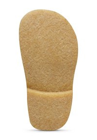 Suola in crepe scamosciato color tan con superficie texturizzata e una sezione del tallone ben definita, mostrata su sfondo bianco.