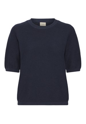 Tamsiai mėlynas, trumpomis rankovėmis megztas džemperis su apvaliomis iškirpėmis ir švelnia tekstūra. Su raukšlėtais kraštais.