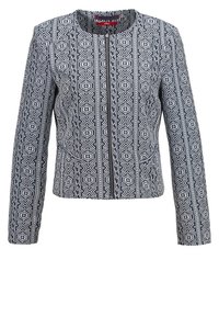 Dopasowana marynarka z geometrycznym czarno-białym wzorem, długimi rękawami i okrągłym dekoltem. Wykonana z gładkiej tkaniny o strukturalnym kroju.