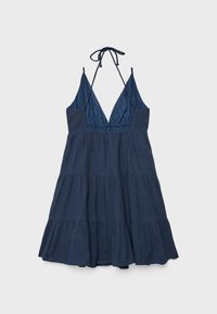 Robe sans manches bleu marine à col halter, jupe à volants et décolleté en V profond, nouée au cou avec de fines bretelles.
