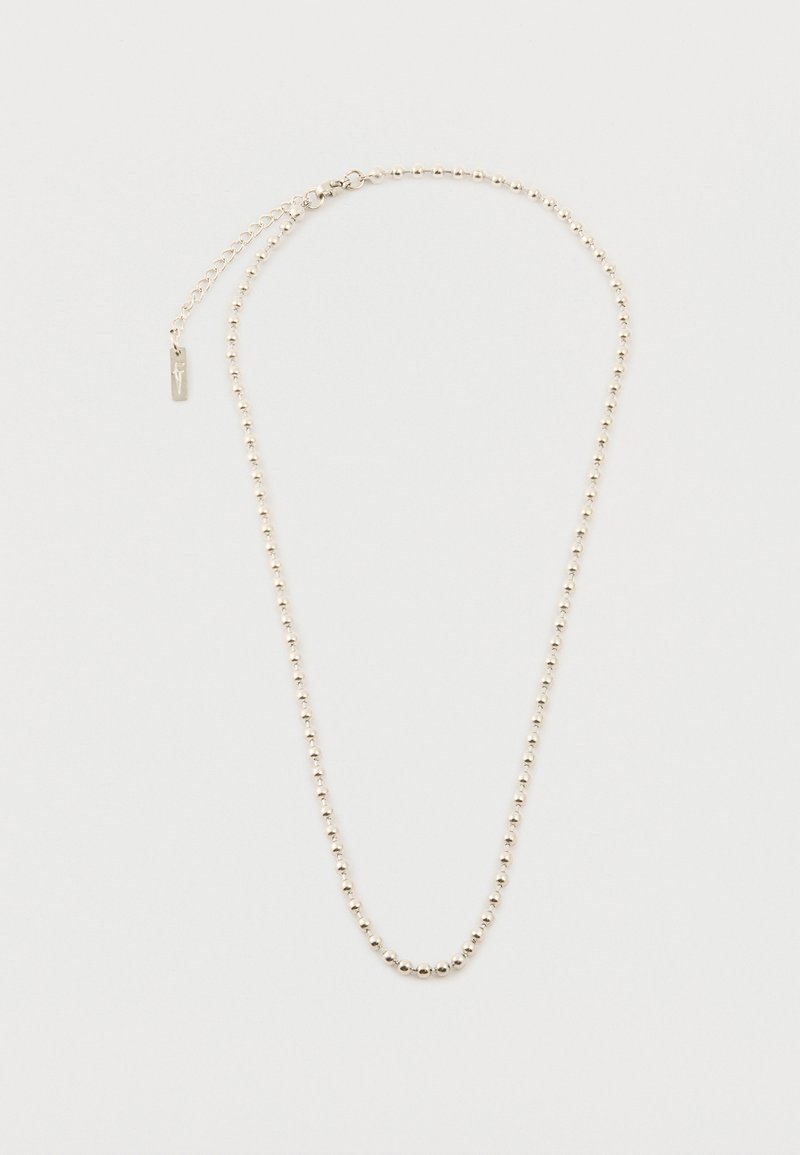 Ασημένιο κολιέ με μικρές στρογγυλές χάντρες και ρυθμιζόμενο κούμπωμα αλυσίδας πάνω σε λευκό φόντο.