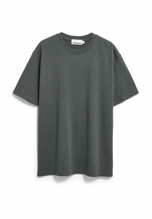 Donkergroen T-shirt met korte mouwen, gemaakt van zacht katoen. Heeft een klassieke ronde hals en een losse pasvorm met minimale stikdetails.