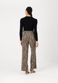 ONLY ONLCLARA PULLUP PANT  - Trousers - black