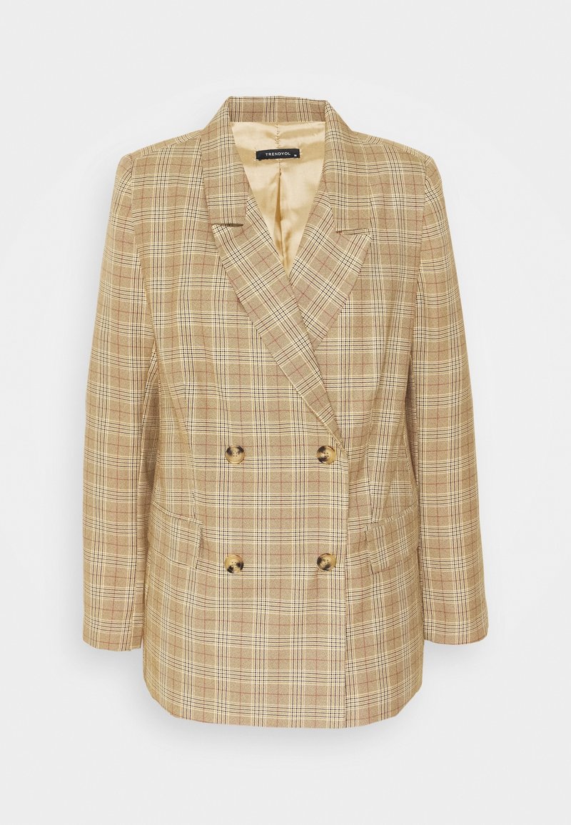 Veste croisée beige et marron clair à carreaux avec quatre boutons et revers crantés, présentée sur fond blanc.