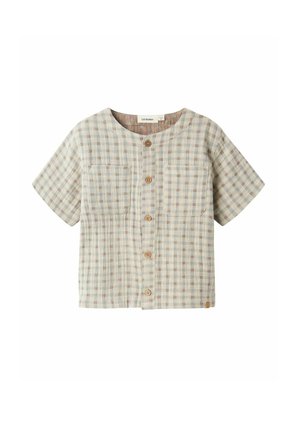 Chemise à manches courtes boutonnée avec un motif à carreaux clair aux tons terreux. Confectionnée en tissu texturé, elle comporte deux poches avant et des boutons en bois.