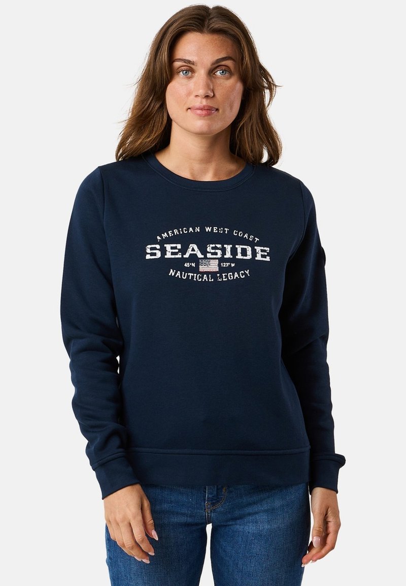 Donkerblauwe sweatshirt van katoenmix met een ronde halslijn, voorzien van de tekst "SEASIDE" en maritieme details in witte print. Soepele textuur.