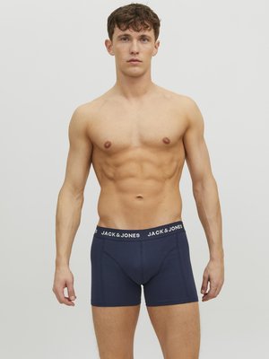 Marineblaue Boxershorts aus weichem Material mit einem gebrandeten elastischen Bund. Sie bieten eine enge Passform und ein klassisches Design.