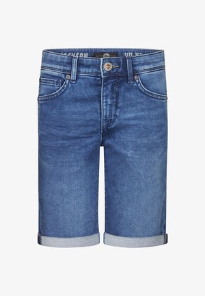 Navy kukka kuvioinen lyhythihainen paita, vaaleanruskeat painatukset, farkkushortsit käärittyinä, valkoiset tennarit ja valkoiset sukat sinisillä raitoineen.