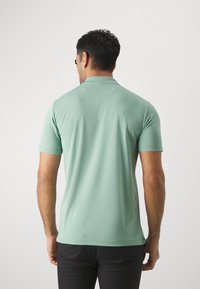 Lyle & Scott GOLF TECH - Poloskjorter - ace teal