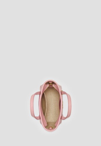 Pink handbag with smooth leather exterior and textured fabric interior. Features dual handles and a zip closure. Interior is lined.