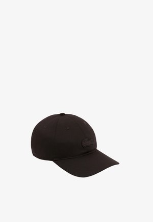 Gorra de béisbol negra con visera curva y sutil logo de cocodrilo bordado en el panel frontal, seis ojales de ventilación, corona estructurada.