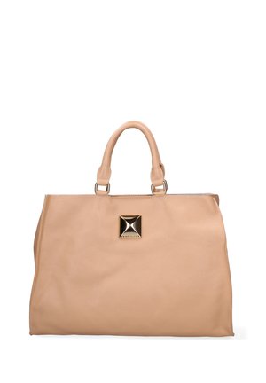 Beige leather handbag with rounded handles and a central gold pyramid-shaped emblem featuring a brand name.