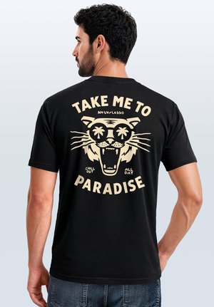 Man facing away wearing a black T-shirt with a tiger face wearing sunglasses and text saying "Take me to paradise, chill out all day."