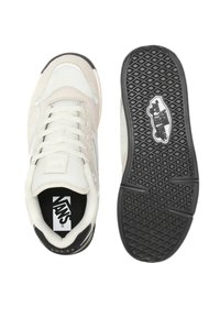 White Vans sneakers with mesh and suede panels, round toe, lace-up front, black accents, cushioned collar, and patterned rubber sole.