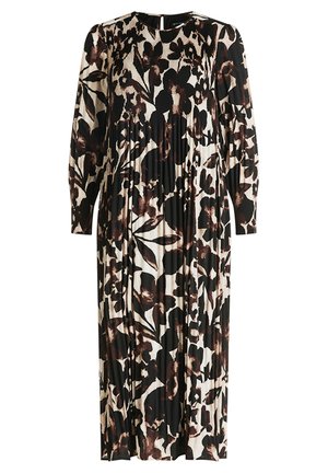 Robe imprimée noire et crème à fleurs, avec des manches longues, une texture plissée et un col rond ornée d'un subtil détail en forme de clé à l'arrière.