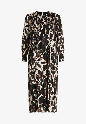 Zwart en crème bloemenpatroon jurk met lange mouwen, geplooide textuur en een ronde halslijn met een subtiele sleutelgatdetail op de rug.
