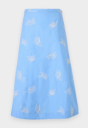 Blue A-line skirt with white floral embroidery scattered across the fabric.