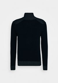 Suéter negro de cuello alto de punto con cuello, puños y dobladillo acanalados, que presenta paneles texturizados en los hombros, exhibido plano sobre un fondo blanco.