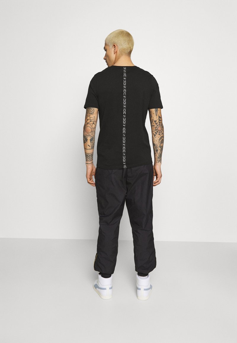 Herren Trainingsanzüge | Puma ICONIC KING TRACK PANTS Jogginghose puma black/schwarz - NR25395 Herren Trainingsanzüge | Puma ICONIC KING TRACK PANTS Jogginghose puma black/schwarz - NR25395