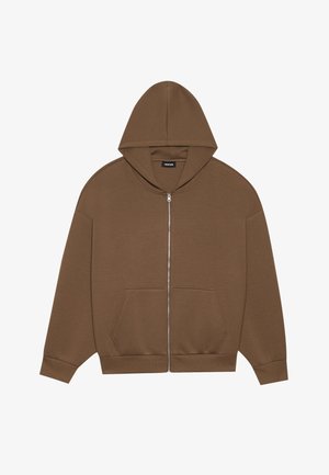 Brun zip-up hoodie med snørebåndshætte, frontlommer og ribbede manchetter. Lavet af blødt stof med en glat tekstur.