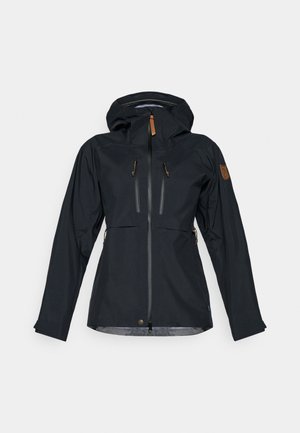 Black waterproof jacket featuring a hood, two zippered chest pockets, and zippers with brown leather pulls. Smooth texture with adjustable cuffs.