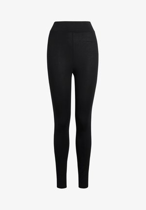 Leggings neri con vita alta, realizzati in un tessuto liscio ed elastico, caratterizzati da un design aderente e senza cuciture visibili.