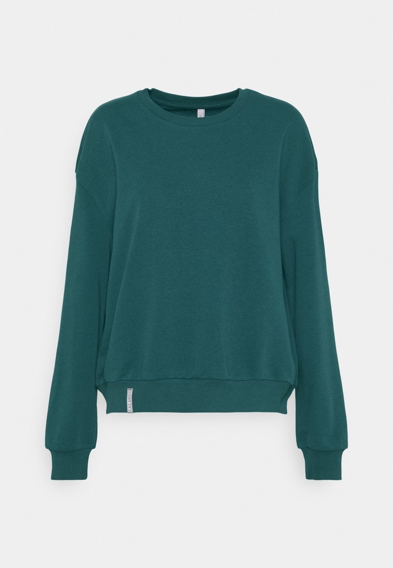Sweat-shirt à manches longues bleu sarcelle foncé avec poignets, ourlet et encolure côtelés, présenté sur fond blanc, avec une petite étiquette latérale.