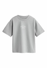 T-shirt en coton gris clair à manches courtes avec col rond et petit texte blanc « UNLIMITED SMILES Everyday » centré sur la poitrine.