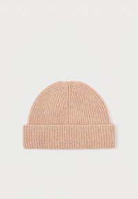 Knit beanie in light pink. Features a ribbed texture, fold-over cuff, and tapered top design. Suitable for cold weather wear.